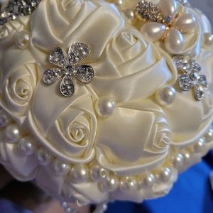 Pearl and rose satin bridal bouquet
